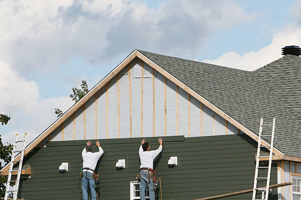 Professional Siding Replacement technician working in Lancaster, PA